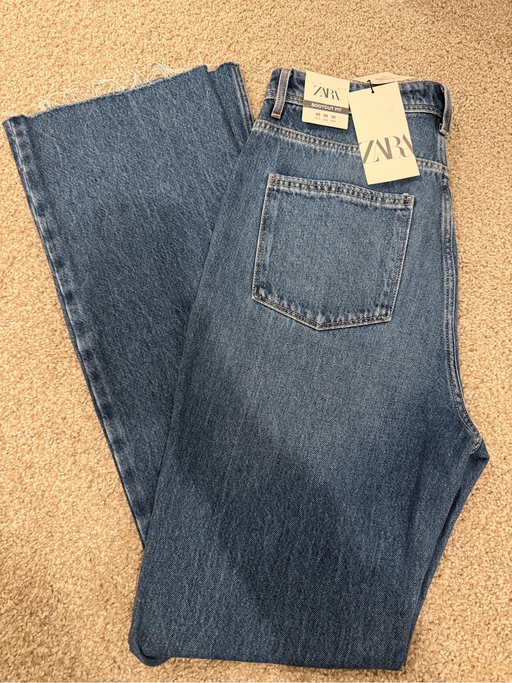 Zara Medium Blue Bootcut Jeans with Raw Hem
